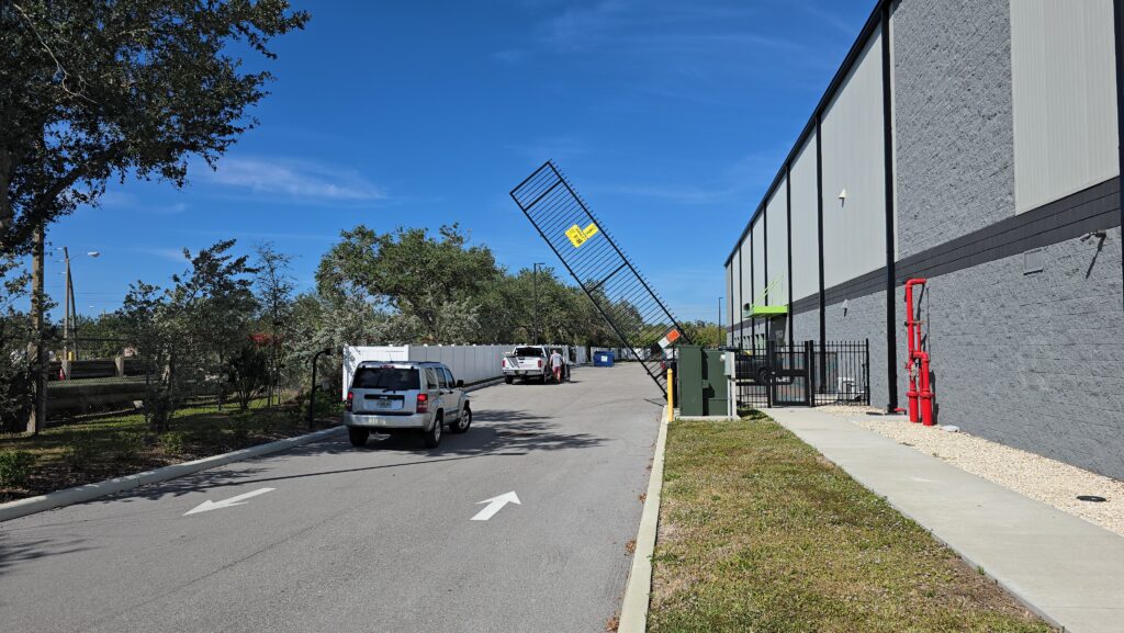 Vertical pivot gate operating at a self-storage facility
